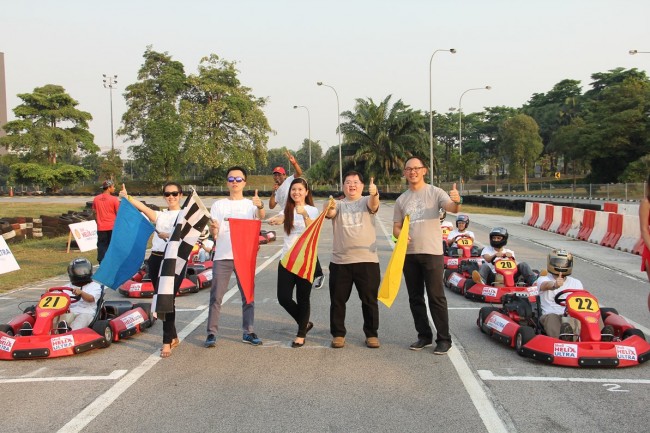 The Shell Lubricants team pose with the 10 contest finalists prior to the flag-off