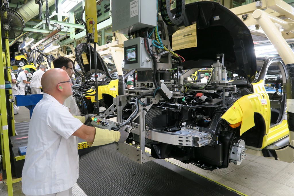 Honda of Canada Mfg. associates install a front-end module on a